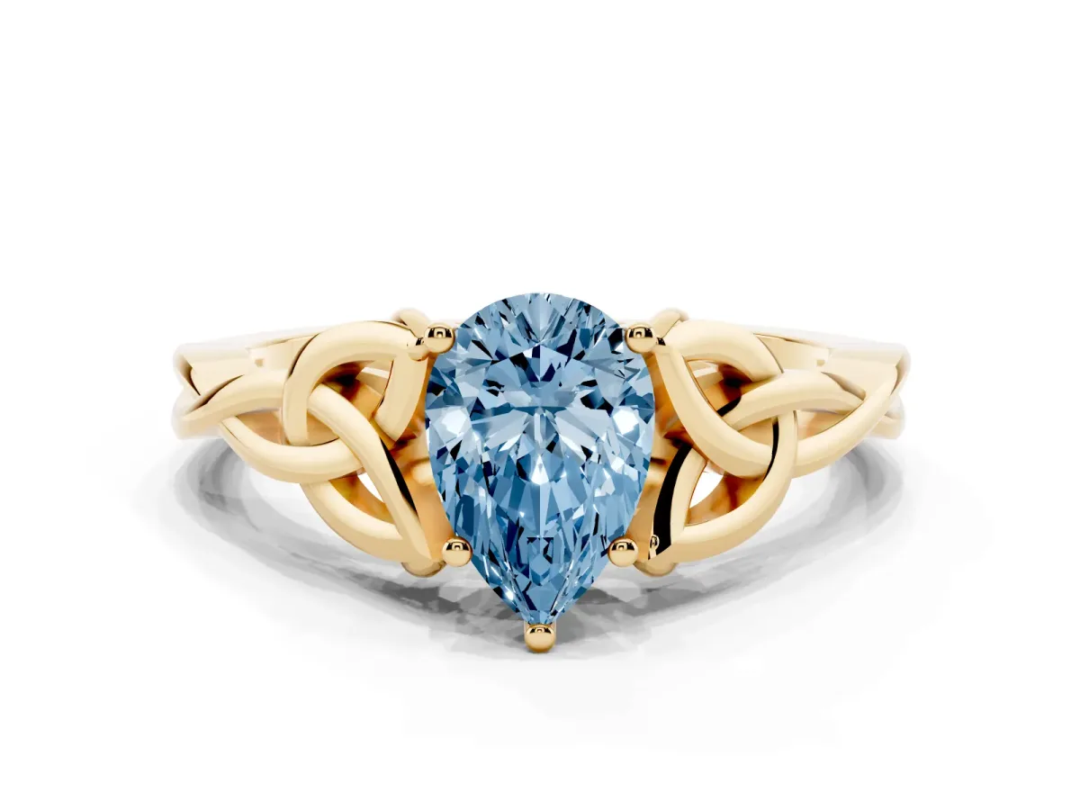 Fancy Blue Pear Cut Diamond Solitaire Engagement Ring with Celtic Knot Band and Four-Prong Setting Yellow gold