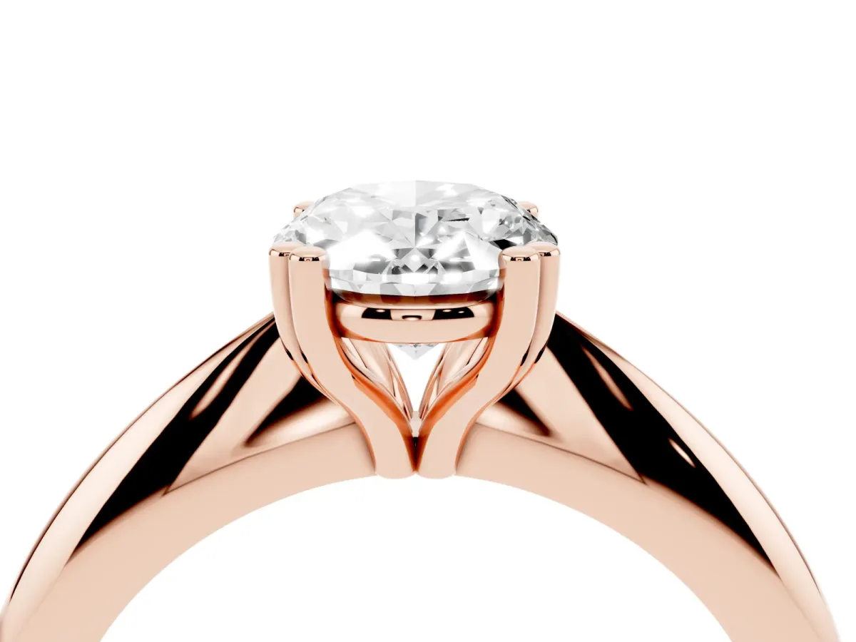 Oval Cut Cut Solitaire Engagement Ring with Tapered Band and Four-Prong Setting Rose gold