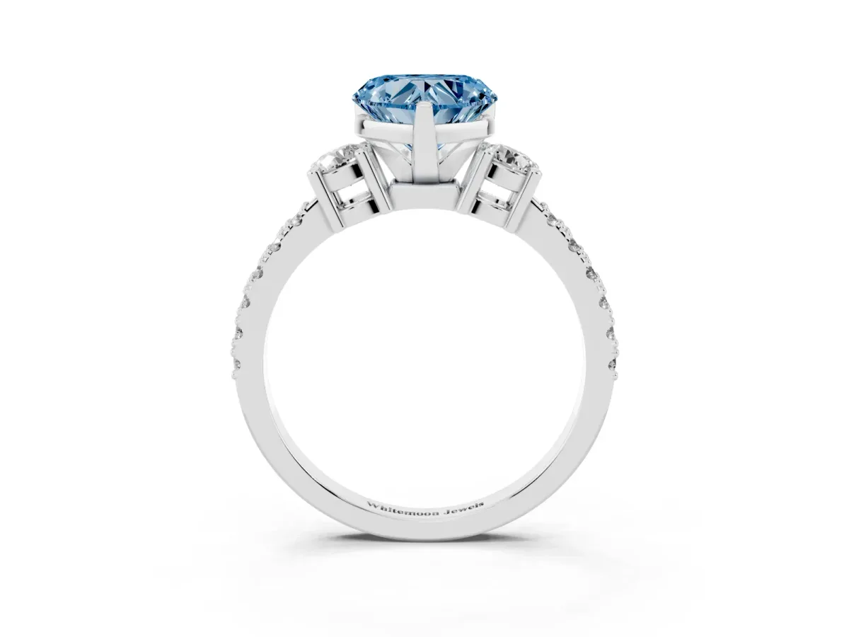 Fancy Blue Heart Cut Three-Stone Diamond Pavé Band with Prong Setting Platinum