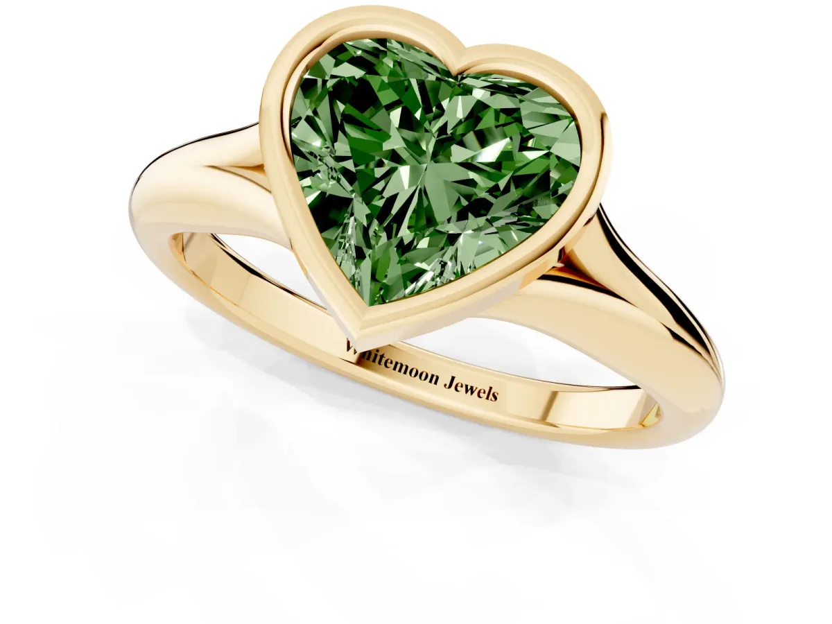 Fancy Green Bezel Set Heart Cut Solitaire Diamond Ring with Smooth Band Yellow gold