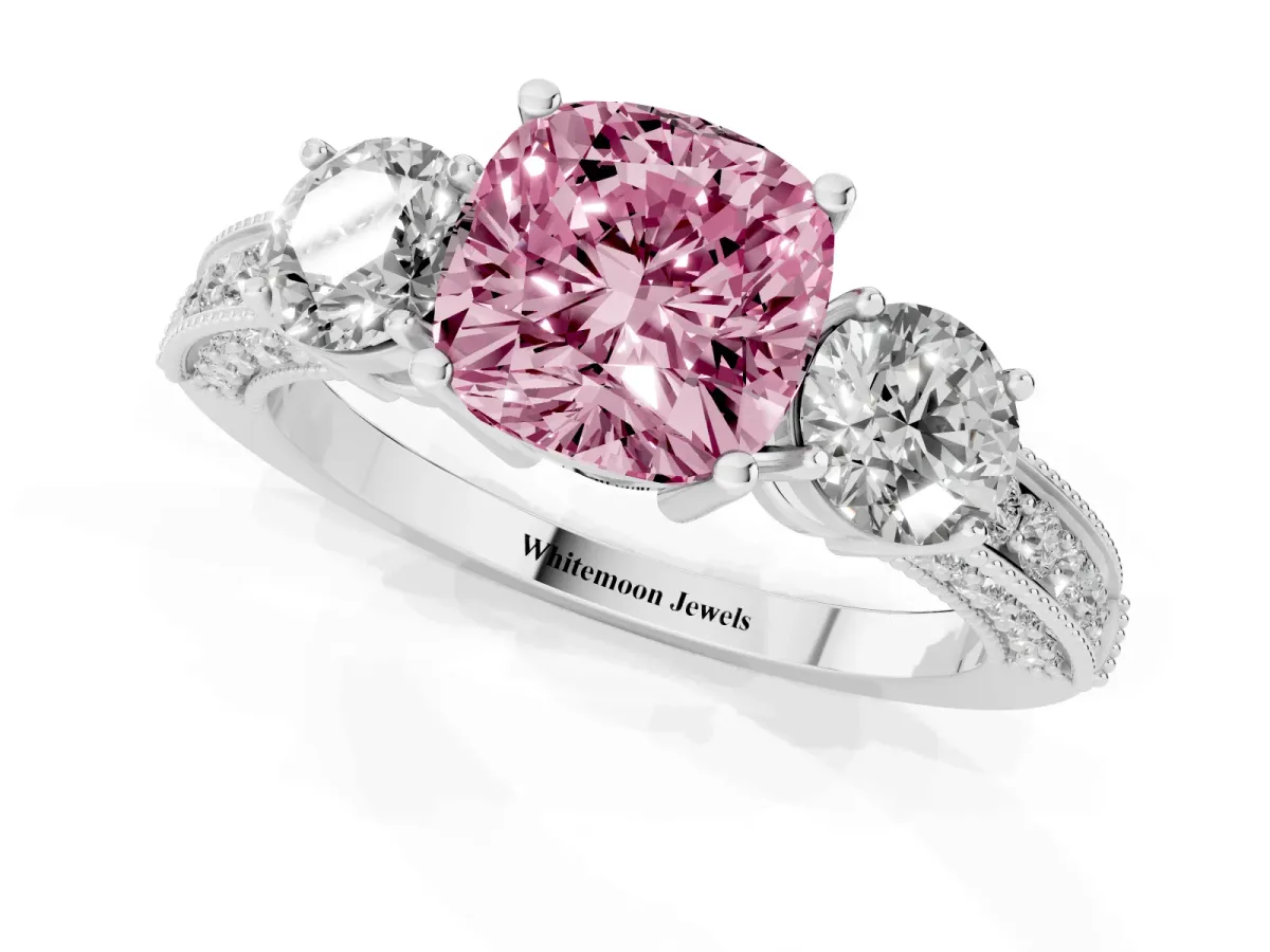Fancy Pink Cushion Cut Three-Stone Diamond Ring with Pavé Band and Four-Prong Setting Silver