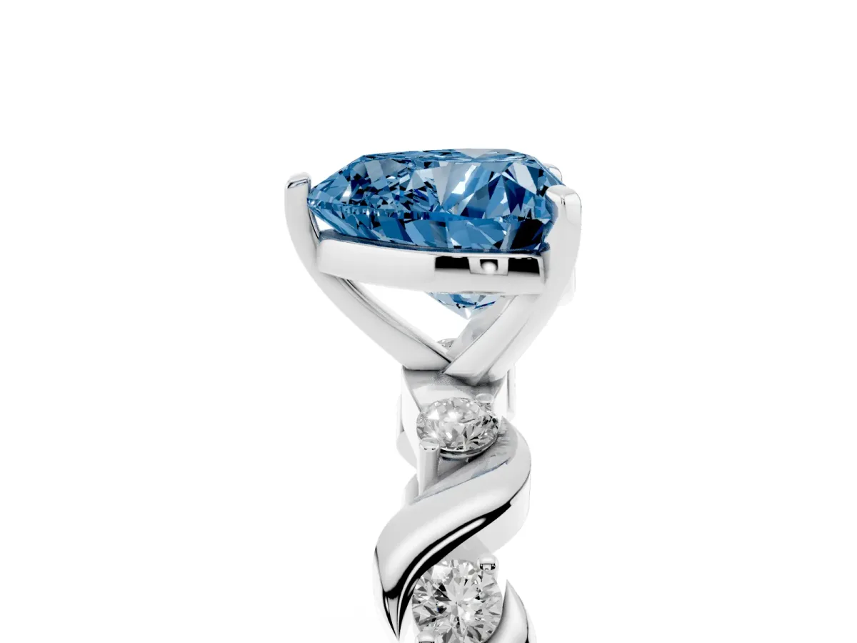 Fancy Blue Heart Cut Diamond Solitaire Twisted Band with Round Accents and Prong Setting Platinum