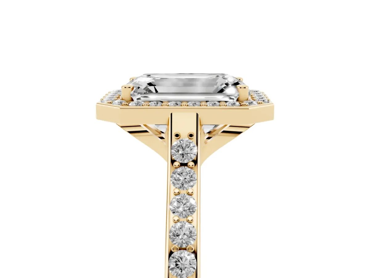 Emerald Cut Diamond Halo Engagement Ring with Round Pavé Shoulders and Prong Setting Yellow gold