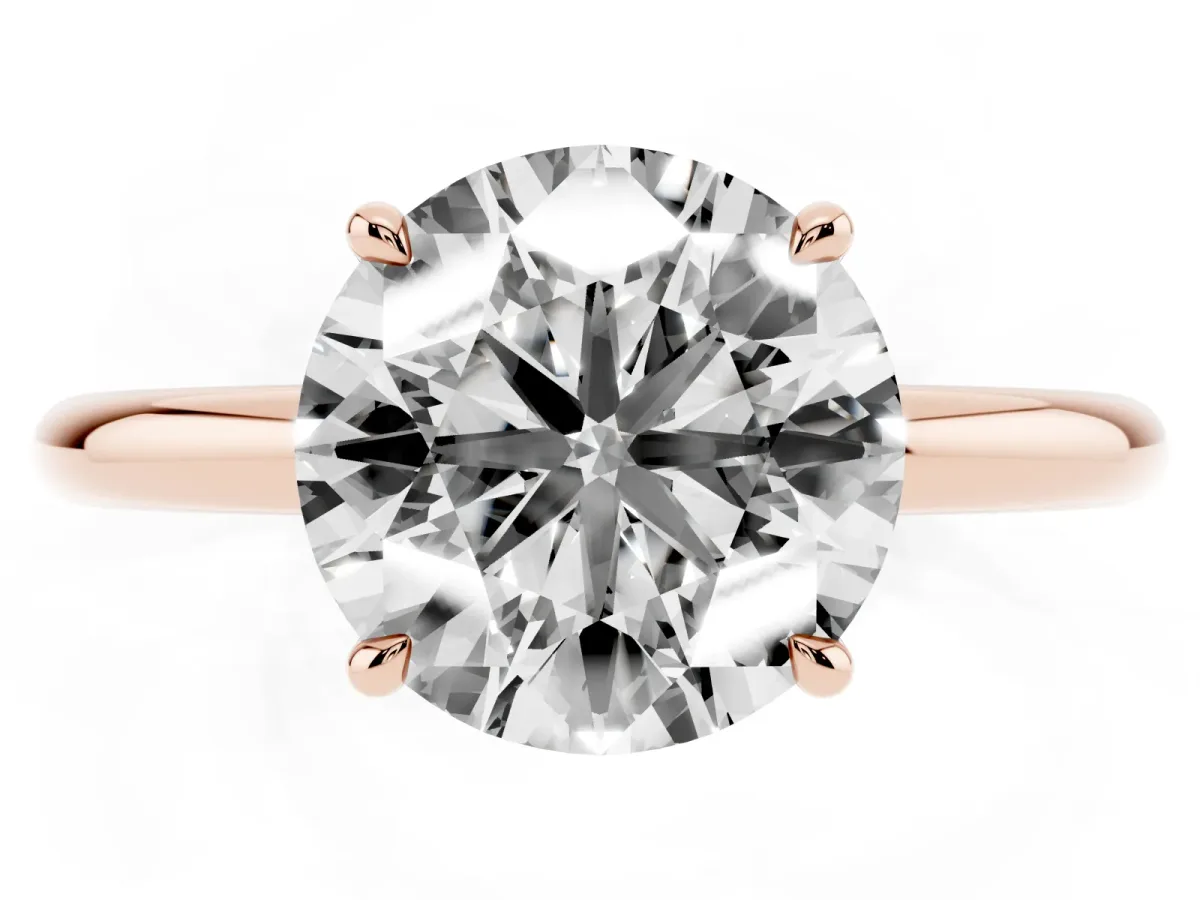 Round Cut Diamond Solitaire Ring with Thin Band and Four-Prong Setting Rose gold