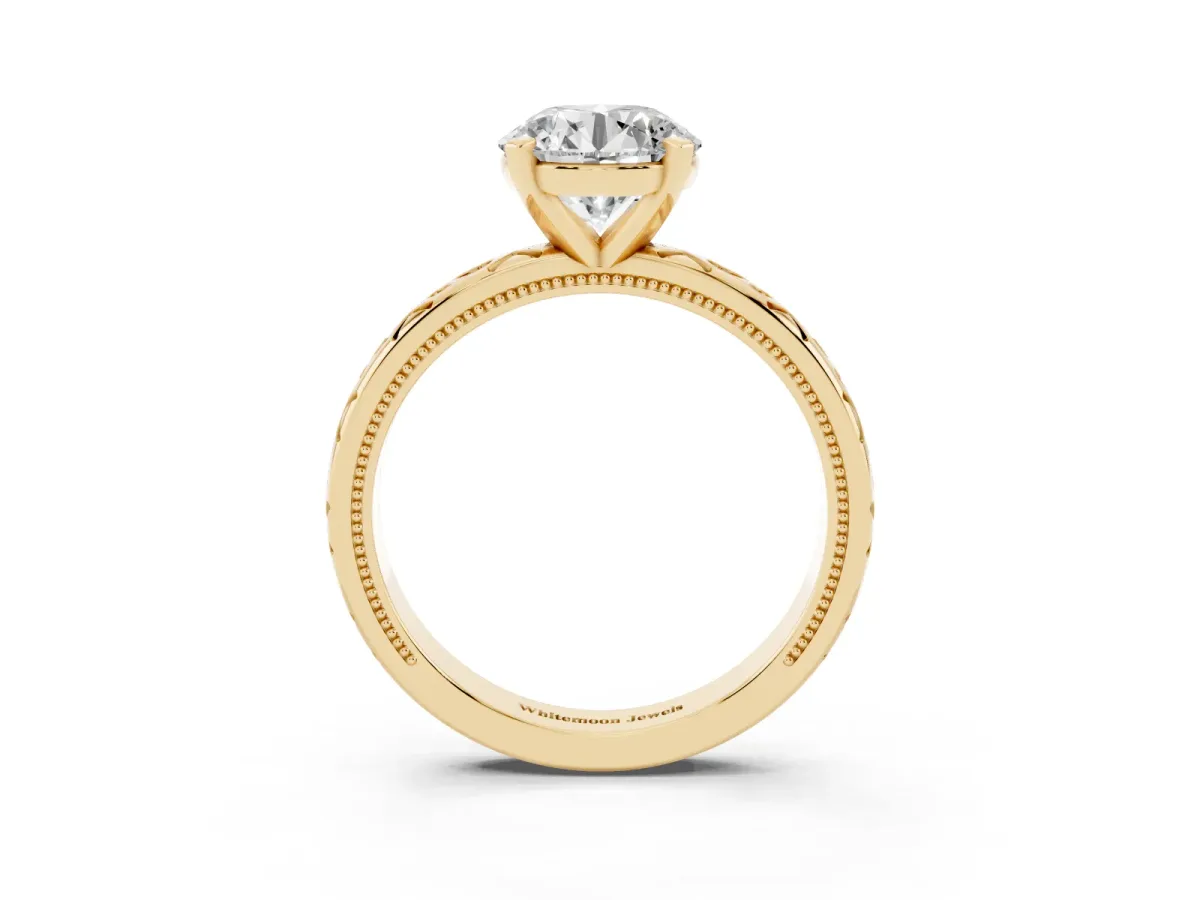 Round Cut Solitaire Engagement Ring with Scrollwork Band and Four-Prong Setting Yellow gold