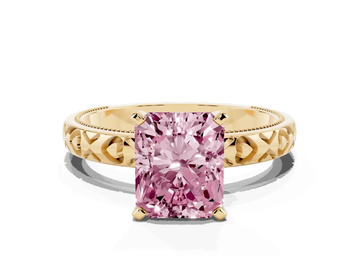Fancy Pink Radiant Cut Solitaire Diamond Engagement Ring with XO Engraved Band and Four-Prong Setting Yellow gold