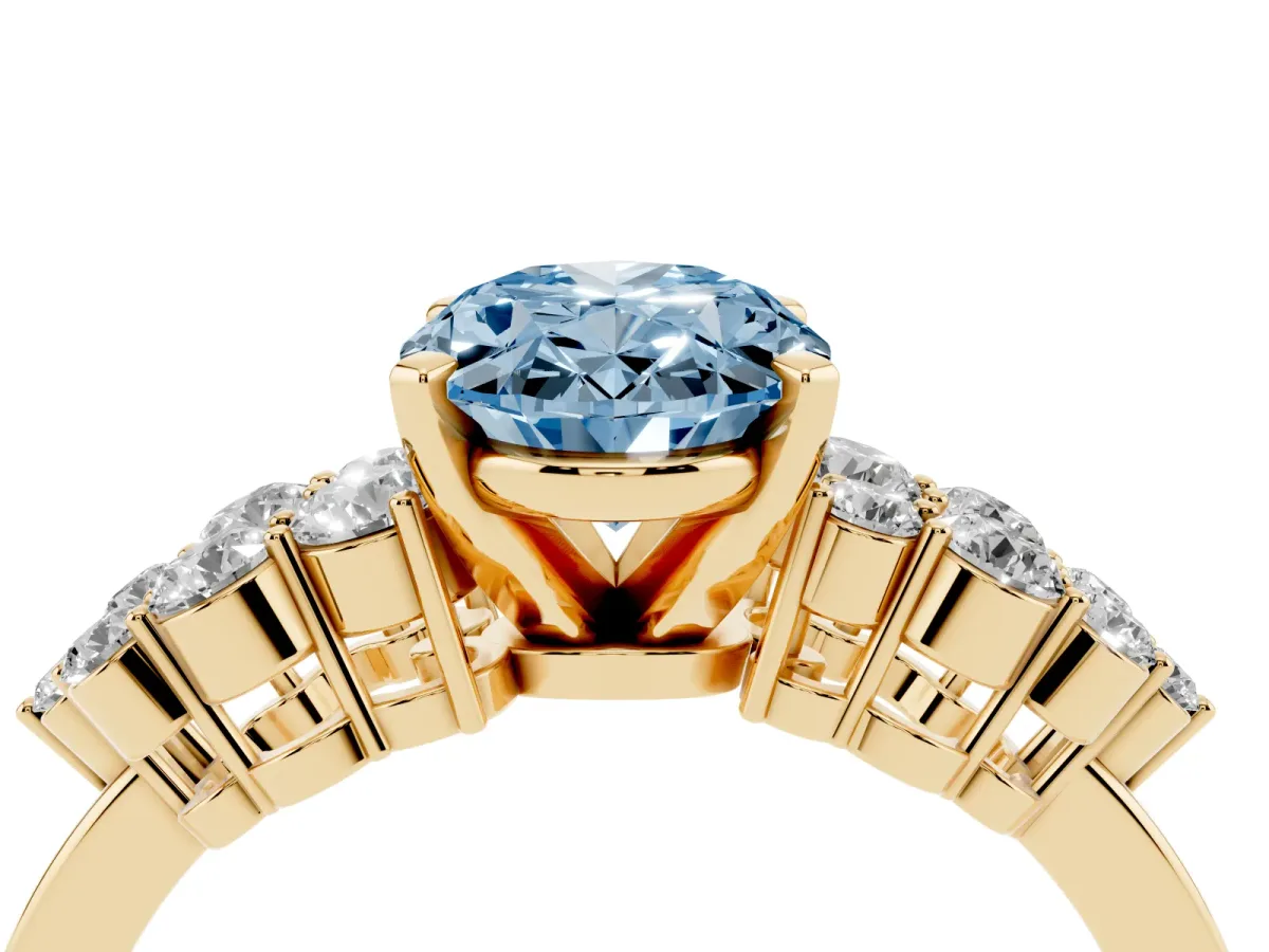 Fancy Blue Oval Cut Cluster Diamond Engagement Ring with Pavé Band and Four-Prong Setting Yellow gold