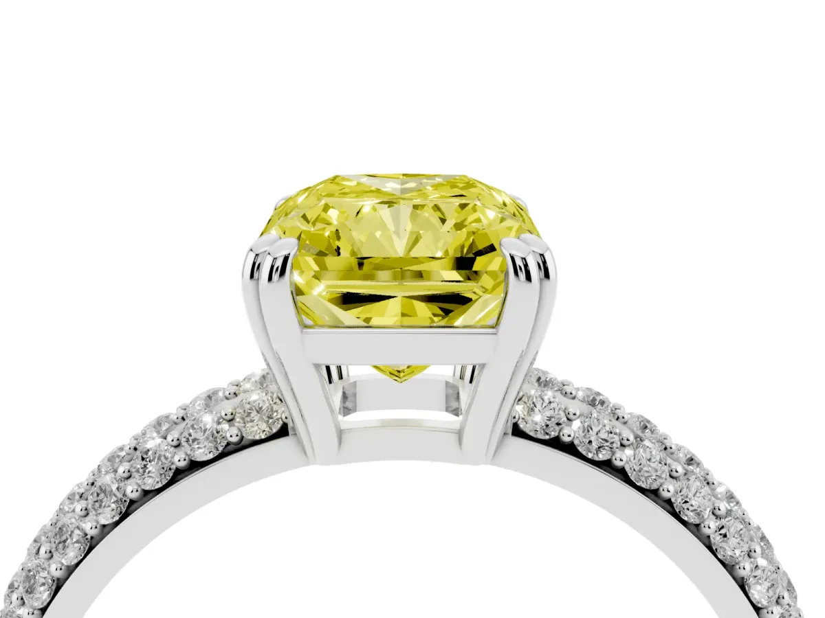 Fancy Yellow Radiant Cut Diamond Solitaire Ring with Multi-Row Round Pavé Band and Prong Setting White gold