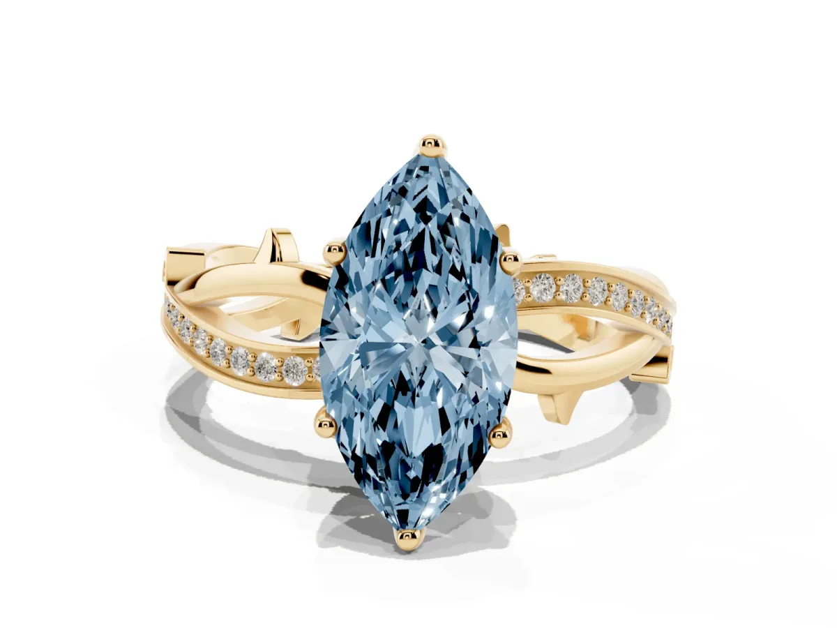Fancy Blue Marquise Cut Solitaire Twist Band with Pavé Accents and Four-Prong Setting Yellow gold