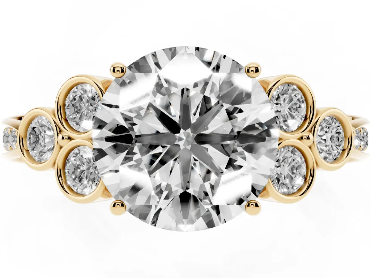 Round Cut Cut Diamond Engagement Ring with Bezel Set Round Side Stones and Prong Setting Yellow gold
