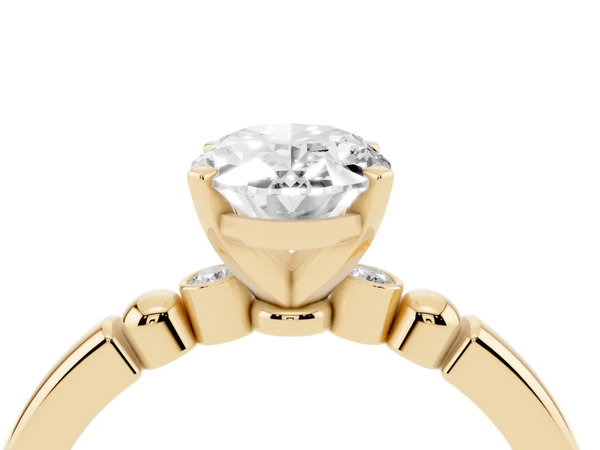 Oval Cut Solitaire Beaded Band with Four-Prong Setting Yellow gold