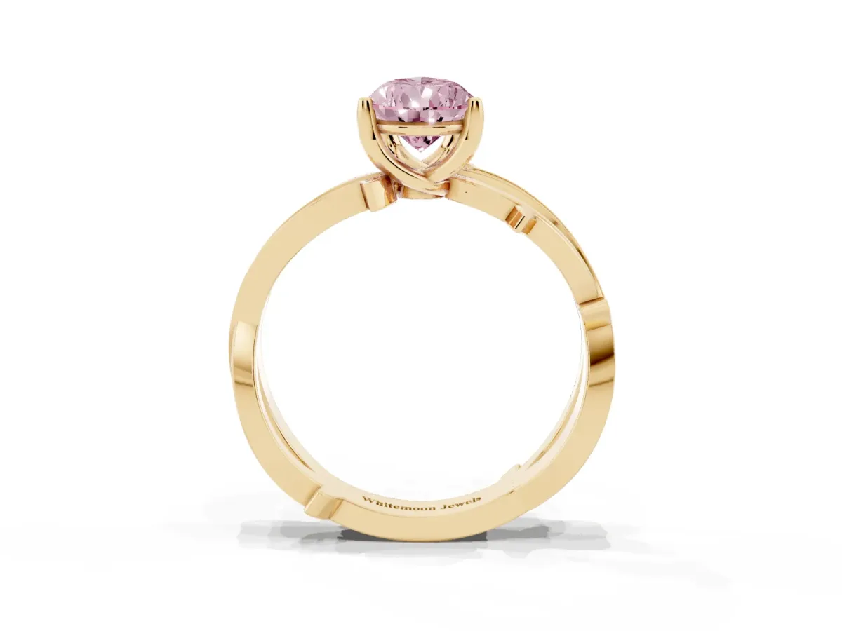 Fancy Pink Pear Cut Solitaire Twist Band with Pavé Accents and Four-Prong Setting Yellow gold