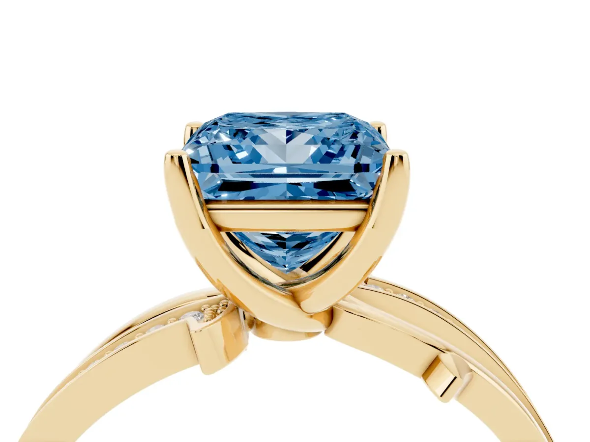 Fancy Blue Princess Cut Solitaire Twist Band with Pavé Accents and Four-Prong Setting Yellow gold