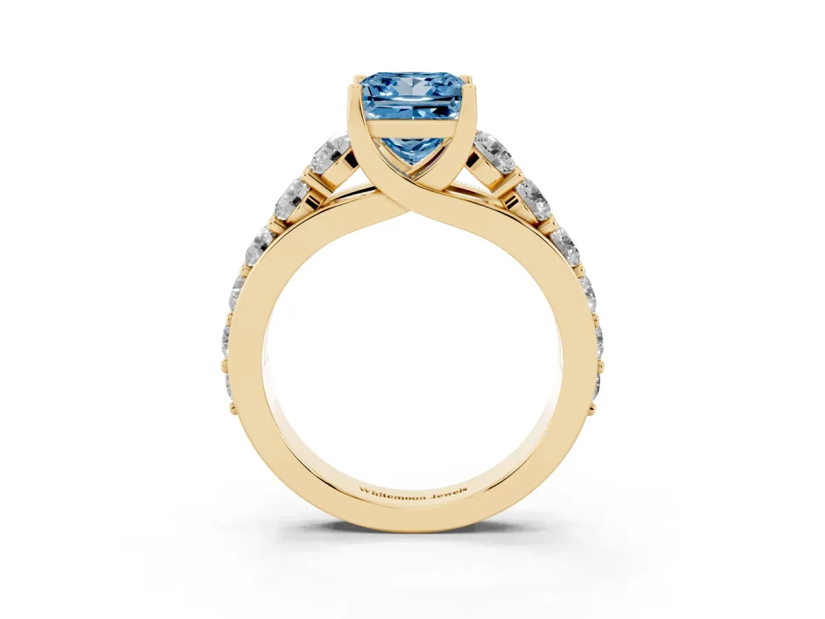 Fancy Blue Princess Cut Diamond Engagement Ring with Pavé Band and Four-Prong Setting Yellow gold