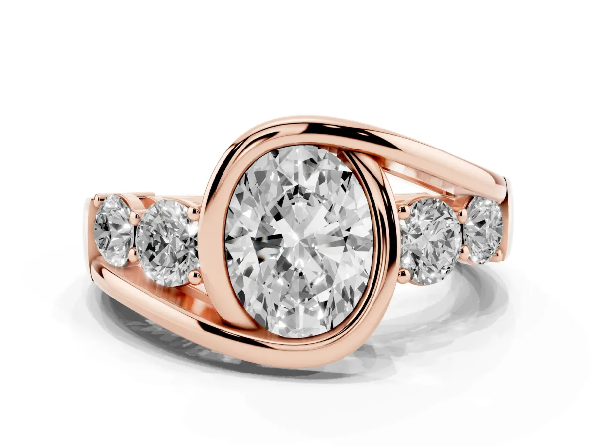 Bezel Set Oval Cut Diamond Bypass Ring with Round Accents Rose gold