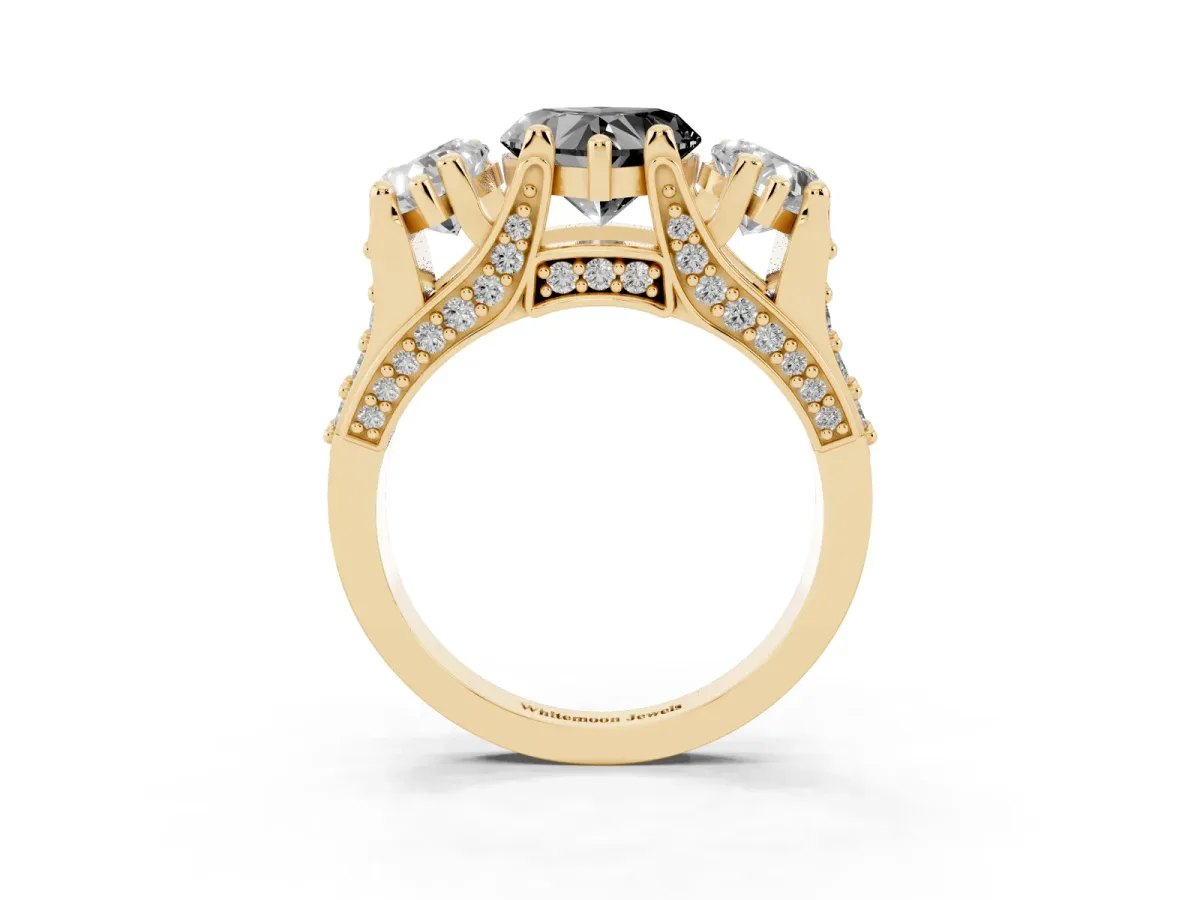 Fancy Black Heart Cut Diamond Three-Stone Ring with Channel Set Band and Four-Prong Setting Yellow gold