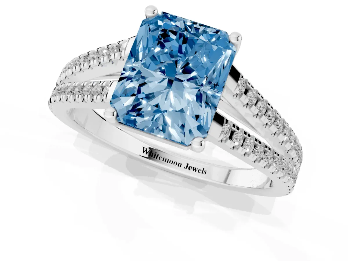 Fancy Blue Radiant Cut Diamond Solitaire Engagement Ring with Split Shank Pavé Band Platinum