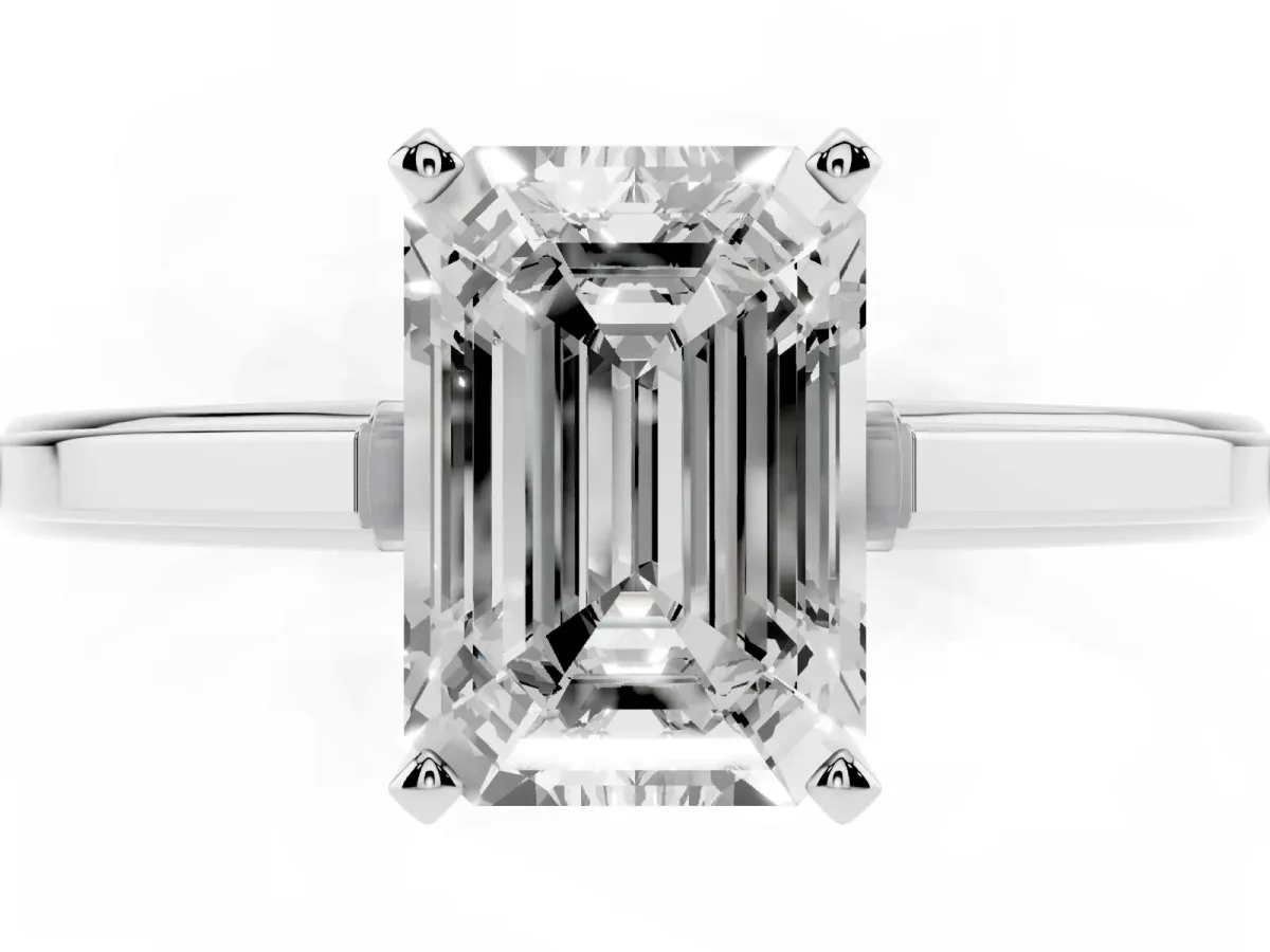 Emerald Cut Solitaire Diamond Ring with Four-Prong Setting and Classic Band Platinum