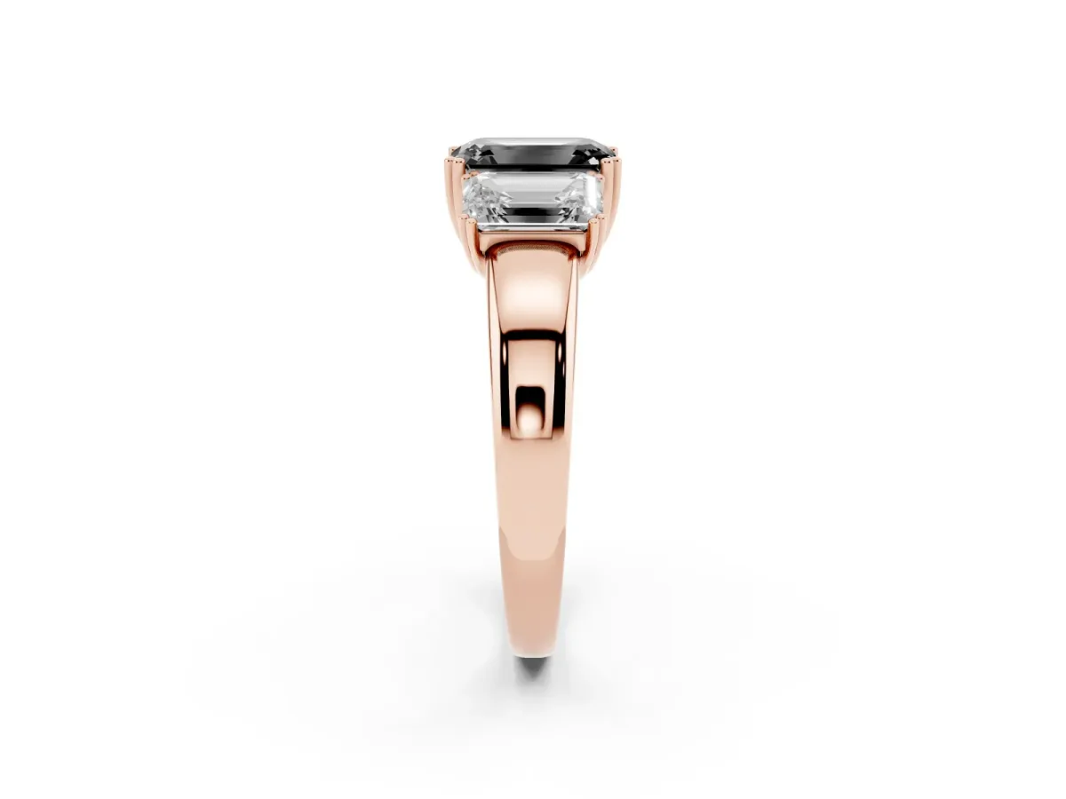 Fancy Black Three-Stone Emerald Cut Cut Diamond Ring with Channel Set Band and Four-Prong Setting Rose gold