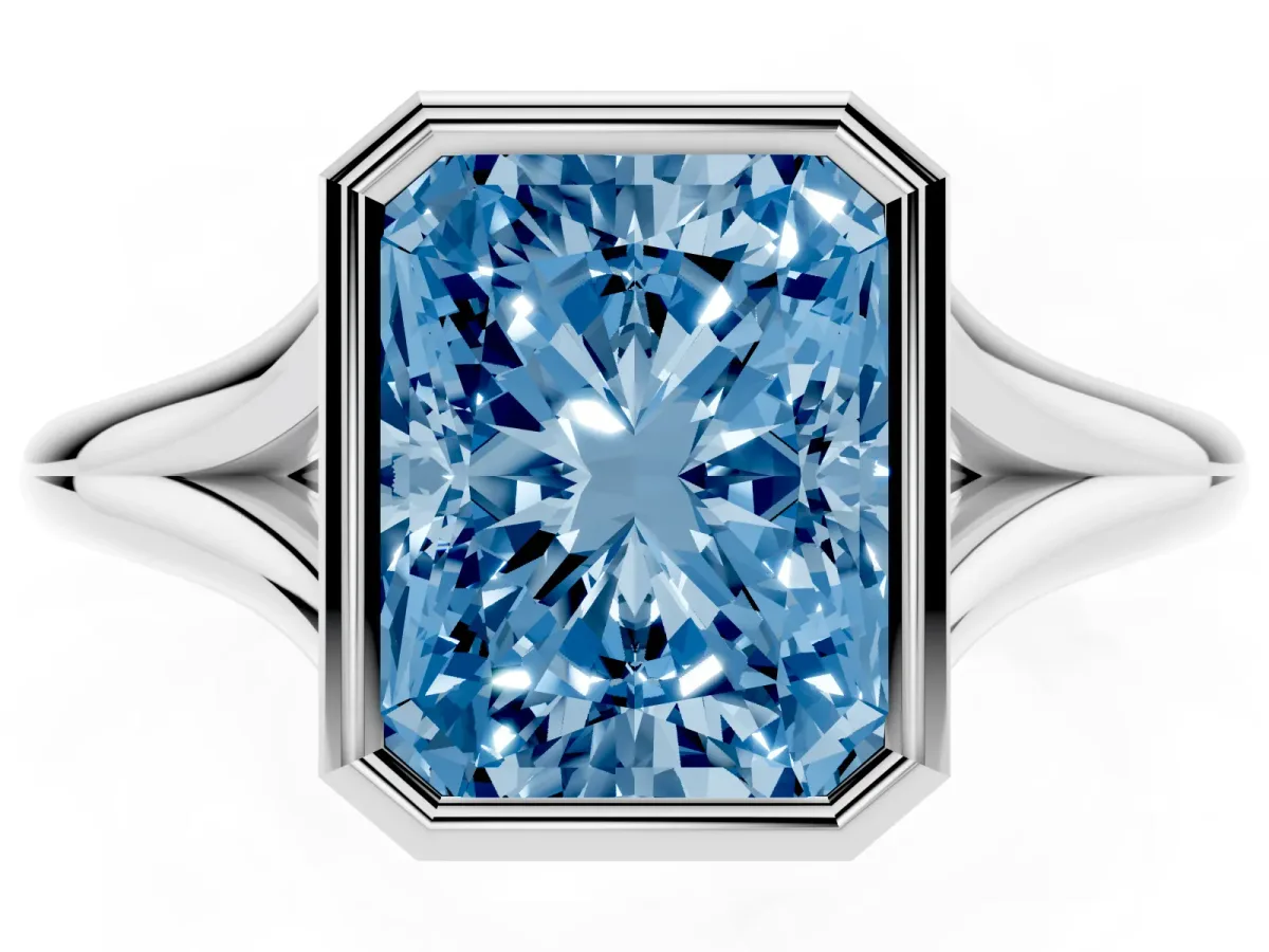 Fancy Blue Bezel Set Radiant Cut Cut Solitaire Ring with Tapered Band Silver