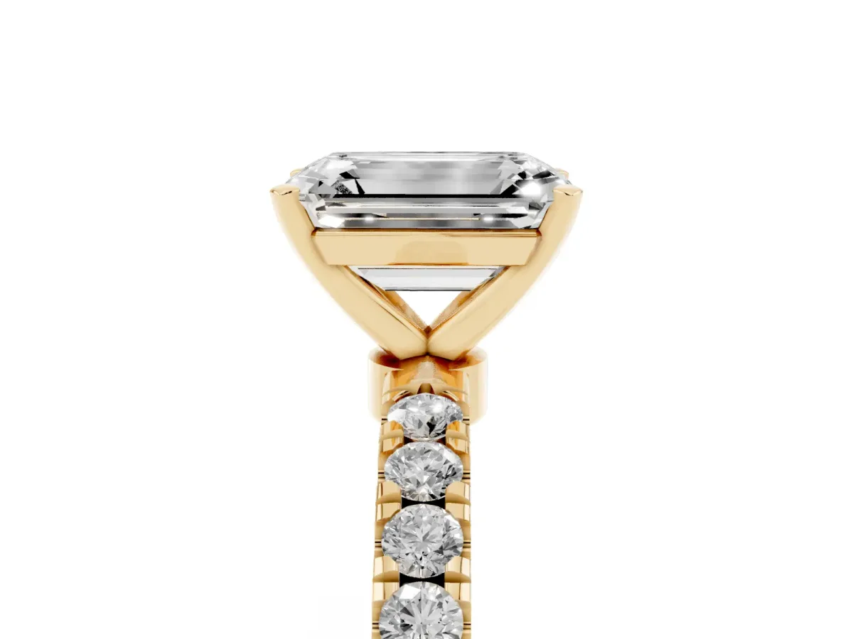 Emerald Cut Diamond Solitaire Ring with Pavé Accents and Four-Prong Setting Yellow gold