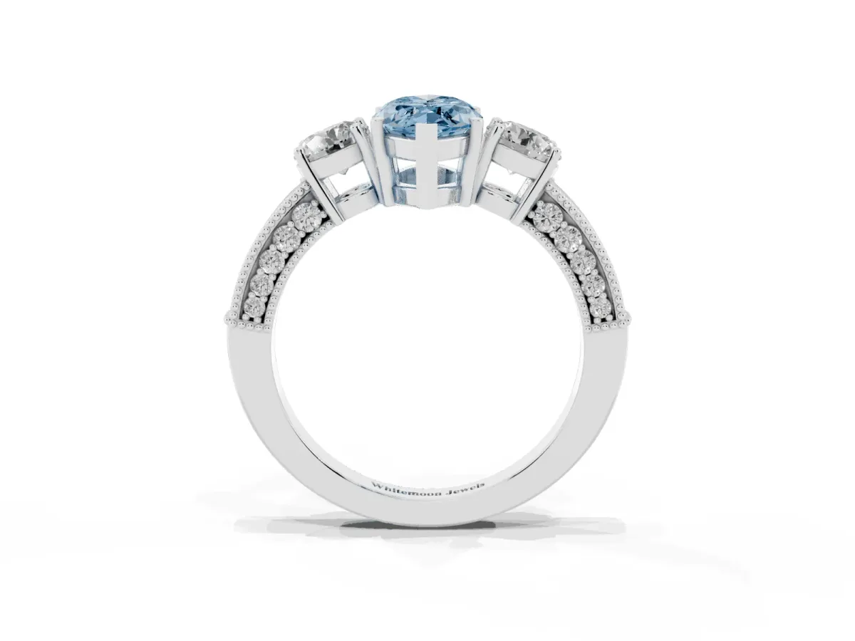Fancy Blue Marquise Cut Three-Stone Diamond Ring with Pavé Band and Four-Prong Setting Silver