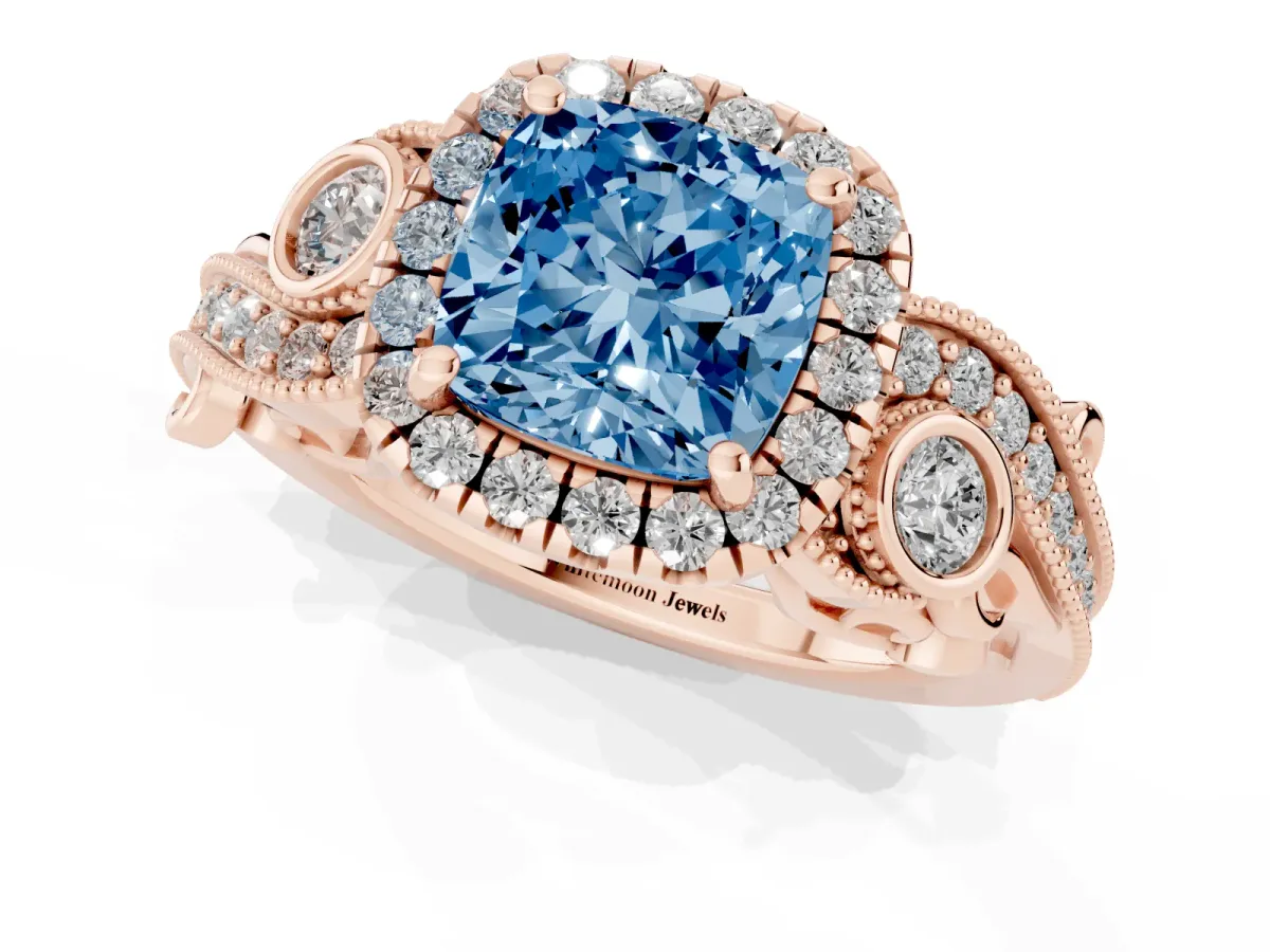 Fancy Blue Cushion Cut Halo Diamond Ring with Milgrain and Bezel Accents on a Split Shank Band Rose gold