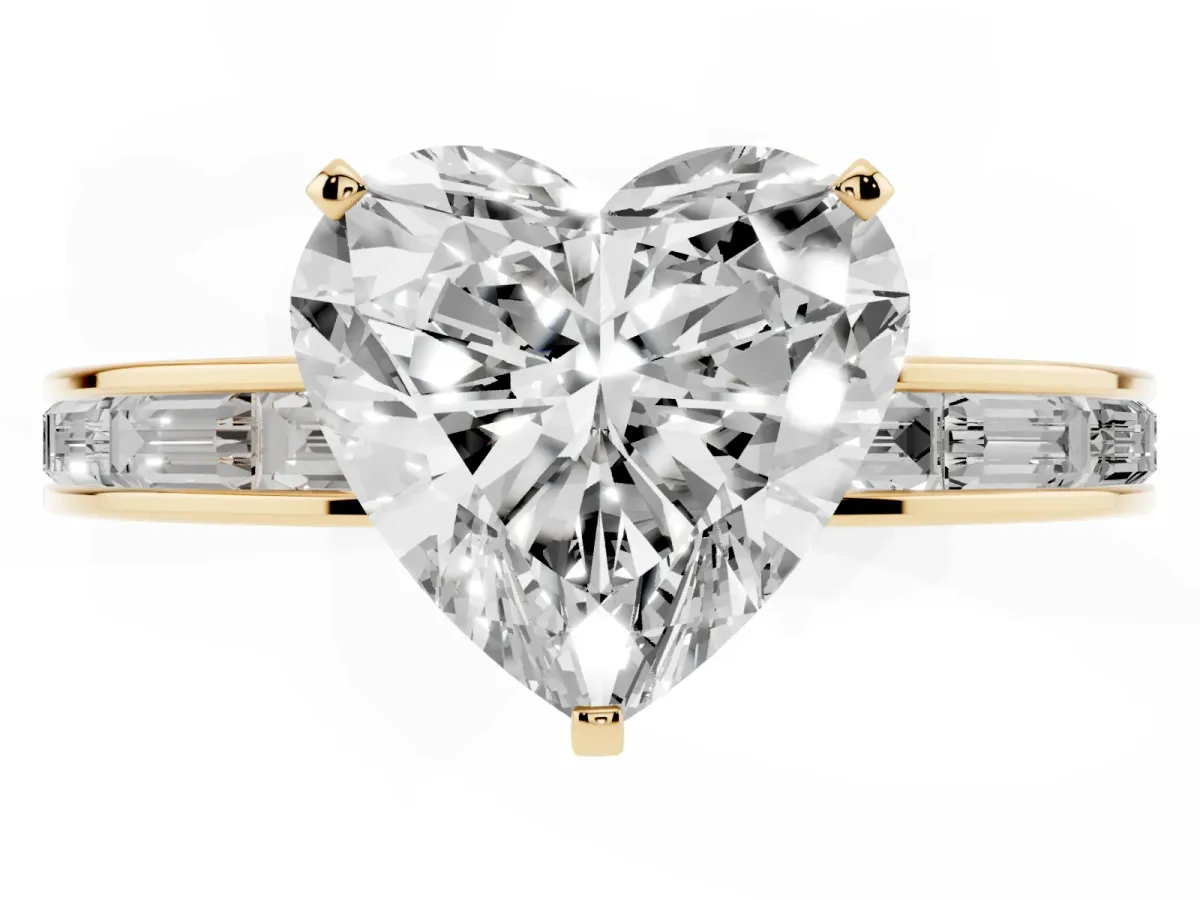 Heart Cut Solitaire Diamond Ring with Channel-Set Baguette Band and Four-Prong Setting Yellow gold