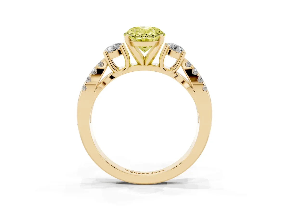 Fancy Yellow Oval Cut Diamond Three-Stone Ring with Pavé Split Shank and Four-Prong Setting Yellow gold