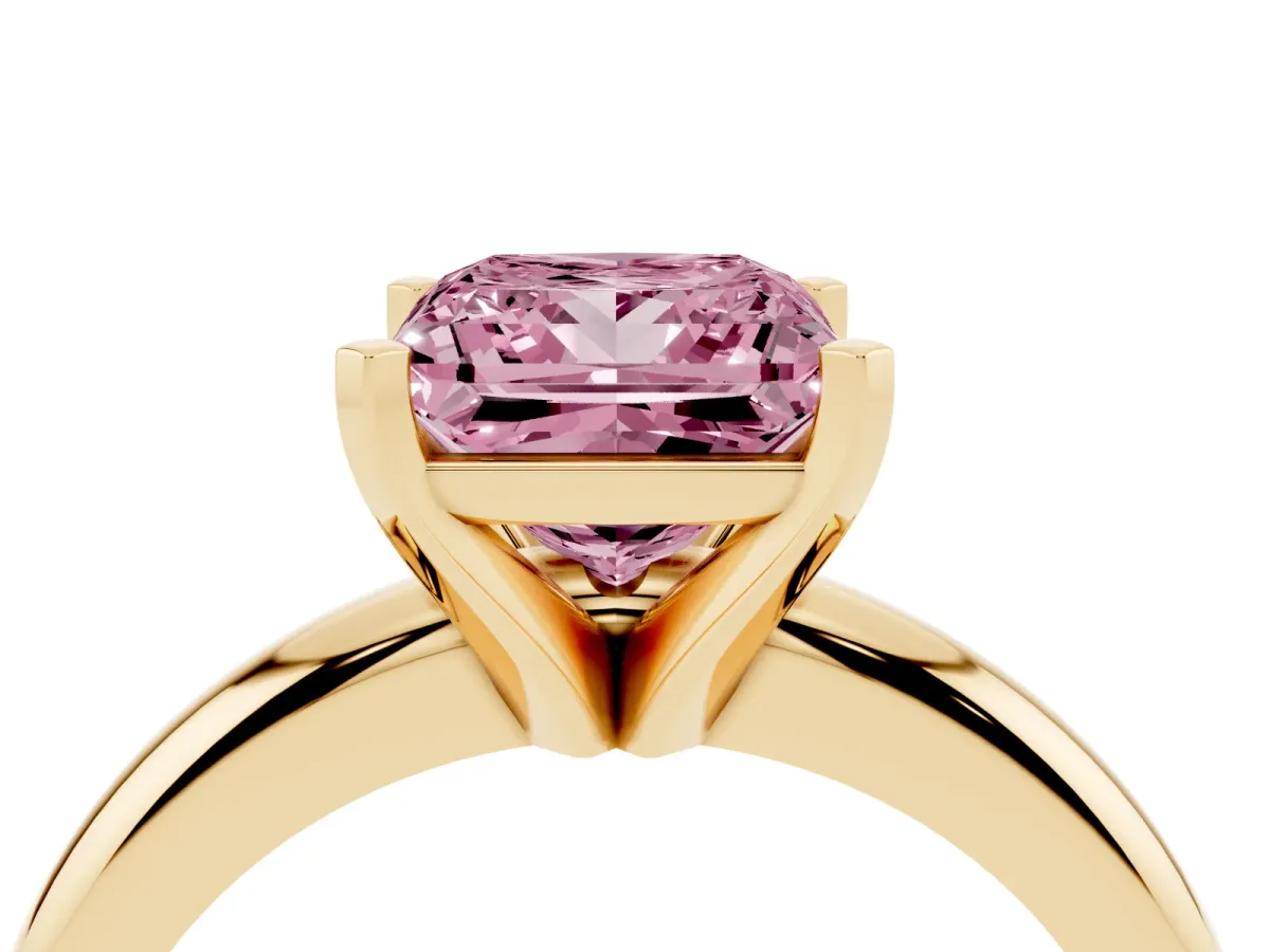 Fancy Pink Princess Cut Diamond Solitaire Engagement Ring with Round Band and Four-Prong Setting Yellow gold