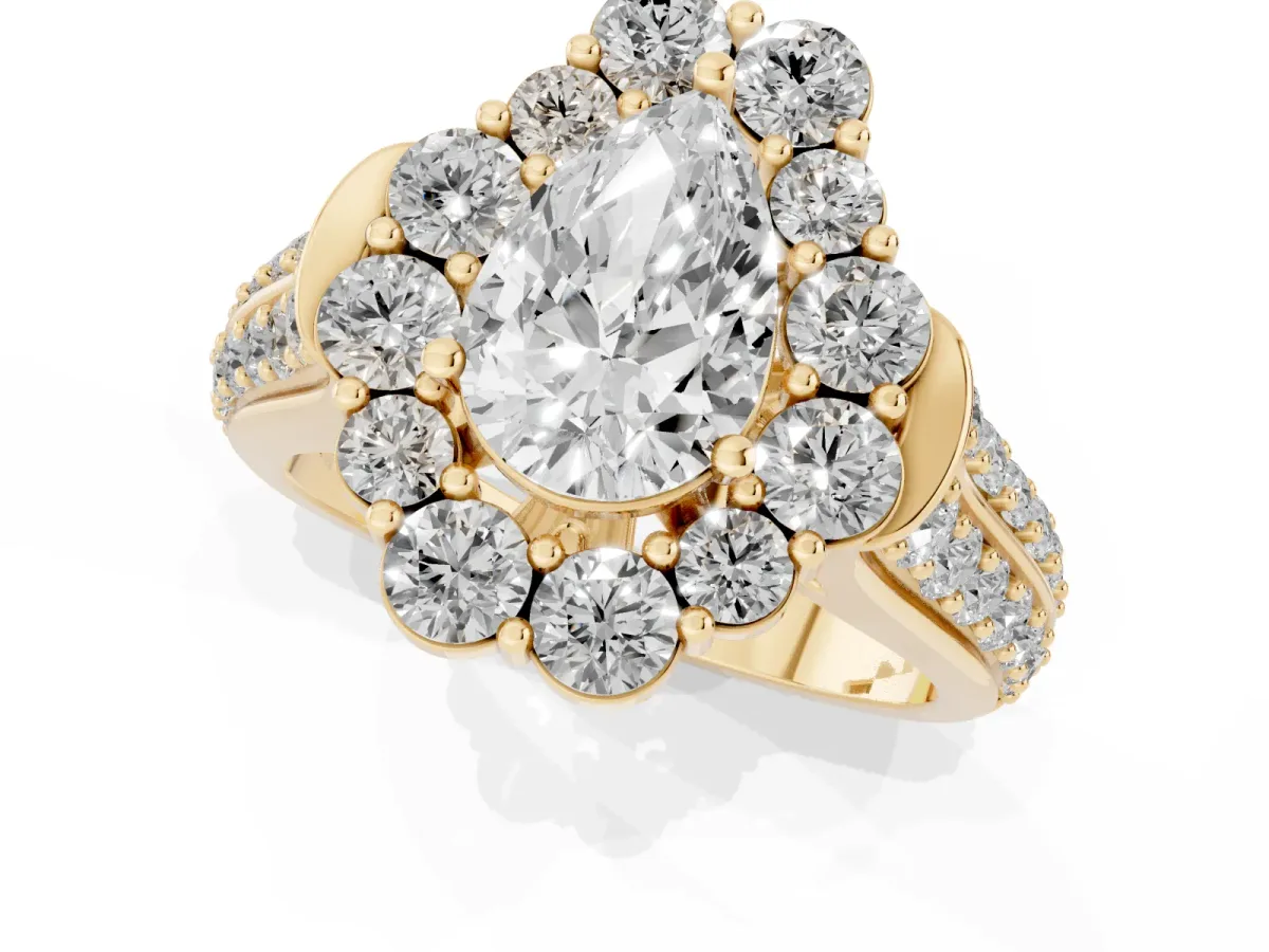 Pear Cut Halo Diamond Engagement Ring with Split Shank and Prong Setting Yellow gold