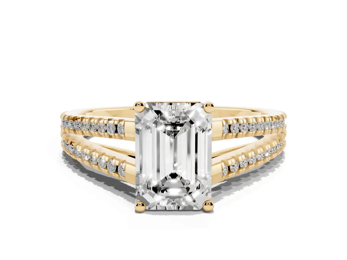 Emerald Cut Diamond Solitaire Engagement Ring with Split Shank Pavé Band Yellow gold