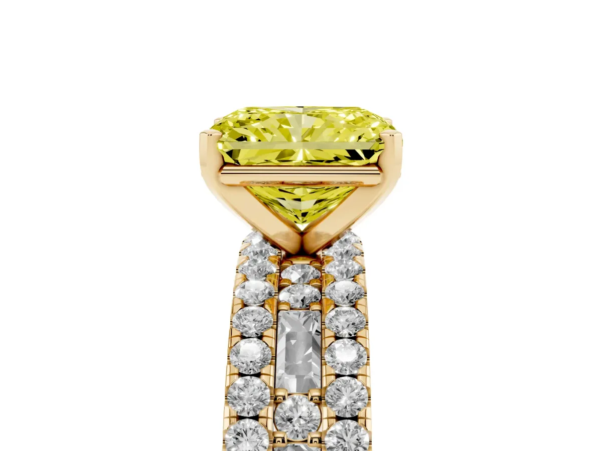 Fancy Yellow Radiant Cut Diamond Solitaire Ring with Pavé and Channel Set Band Yellow gold