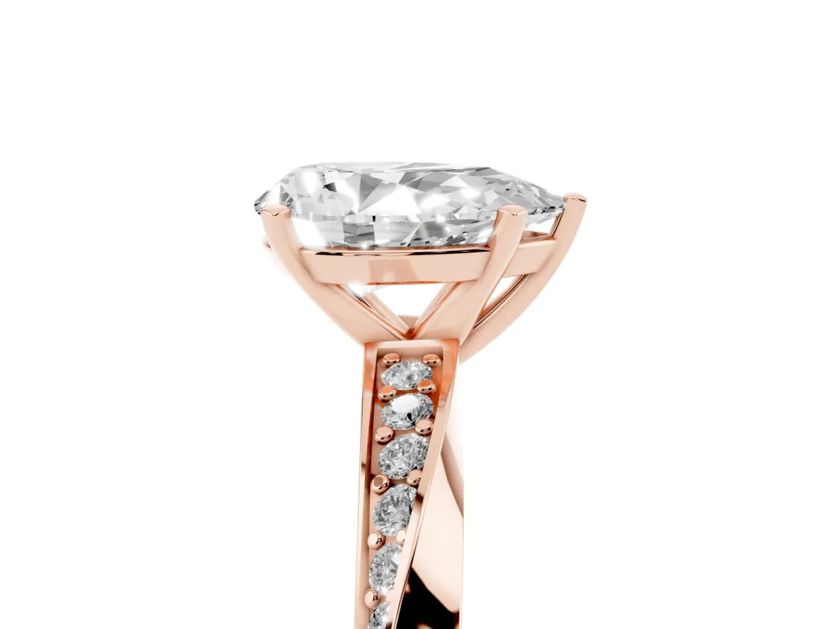 Pear Cut Diamond Engagement Ring with Side Stone Accents and Four-Prong Setting Rose gold