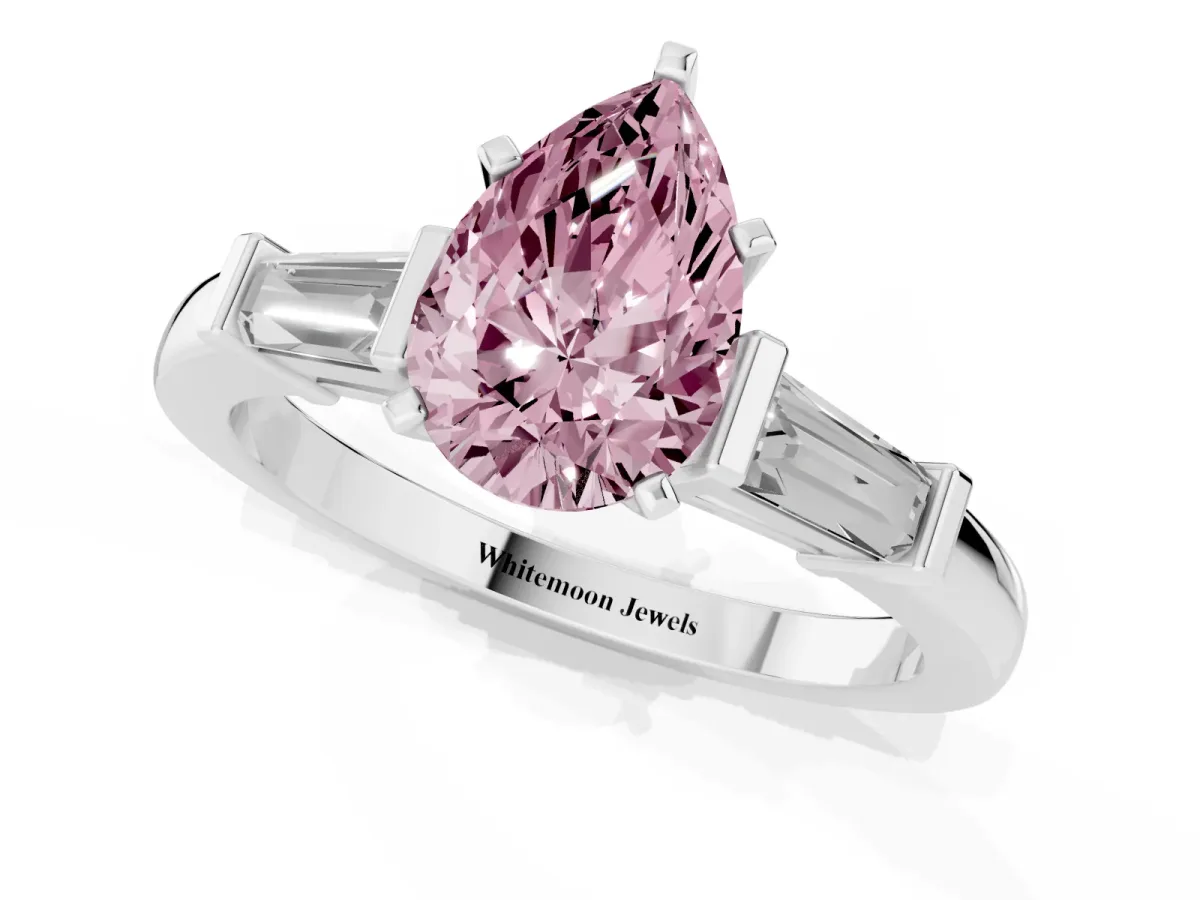 Fancy Pink Pear Cut Cut Diamond Solitaire Ring with Tapered Baguette Accents and Four-Prong Setting Platinum