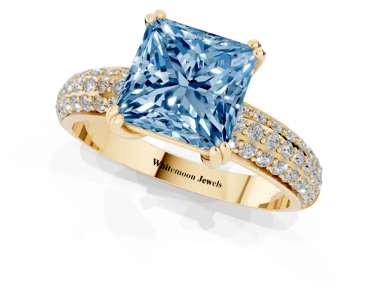 Fancy Blue Princess Cut Diamond Solitaire Ring with Multi-Row Round Pavé Band and Prong Setting Yellow gold