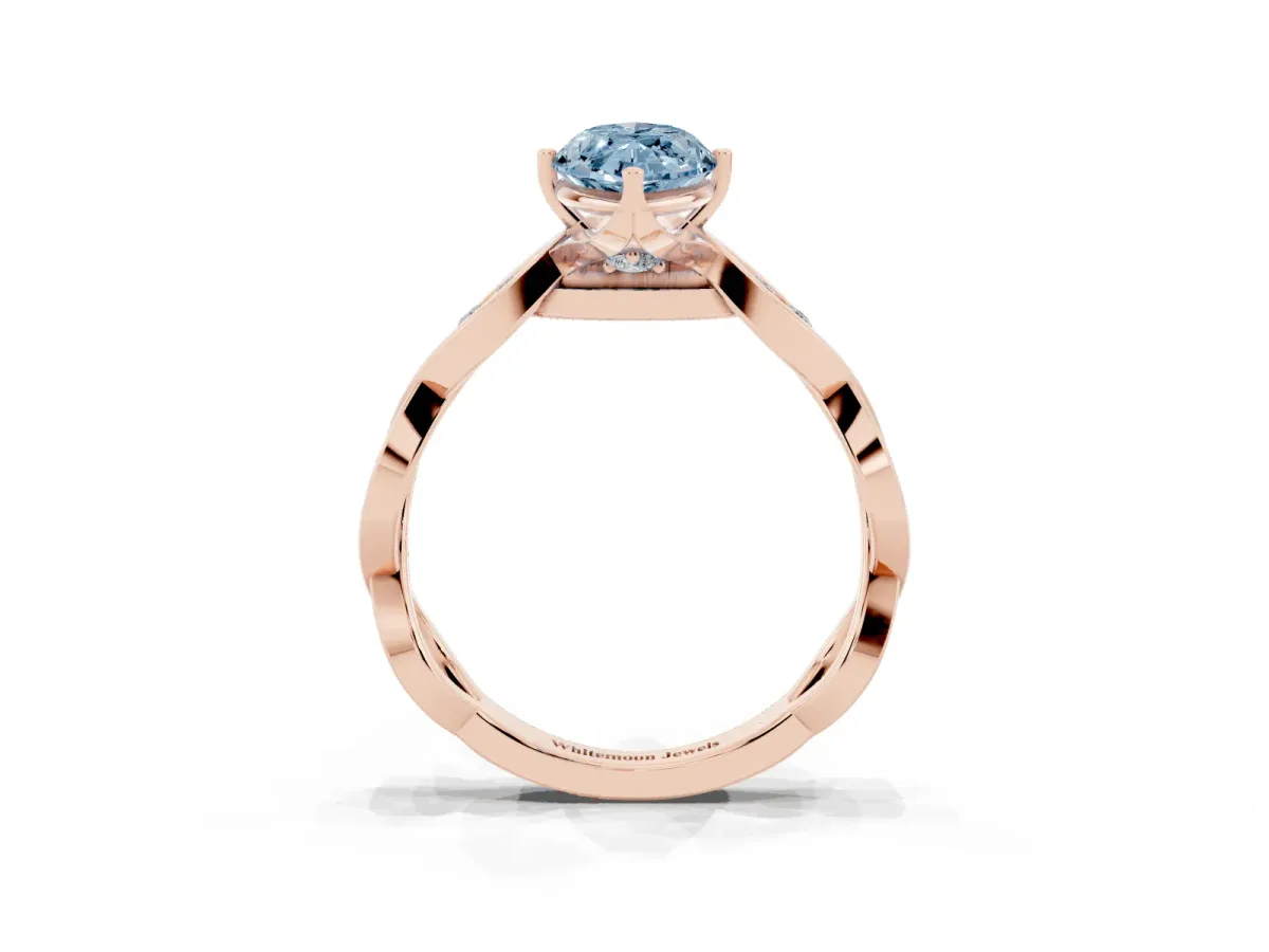 Fancy Blue Marquise Cut Solitaire Twist Band with Leaf Prong Setting Rose gold