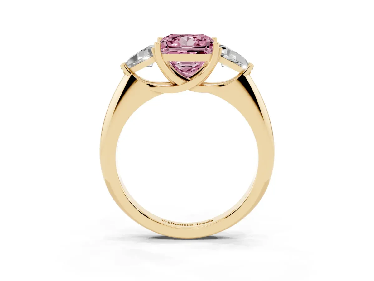 Fancy Pink Three-Stone Princess Cut Diamond Engagement Ring with Trillion Side Stones and Prong Setting Yellow gold