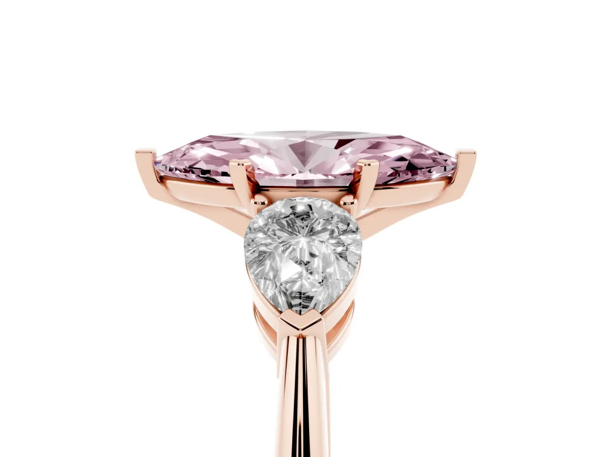 Fancy Pink Three-Stone Marquise Cut Diamond Ring with Pear Side Stones and Four-Prong Setting Rose gold