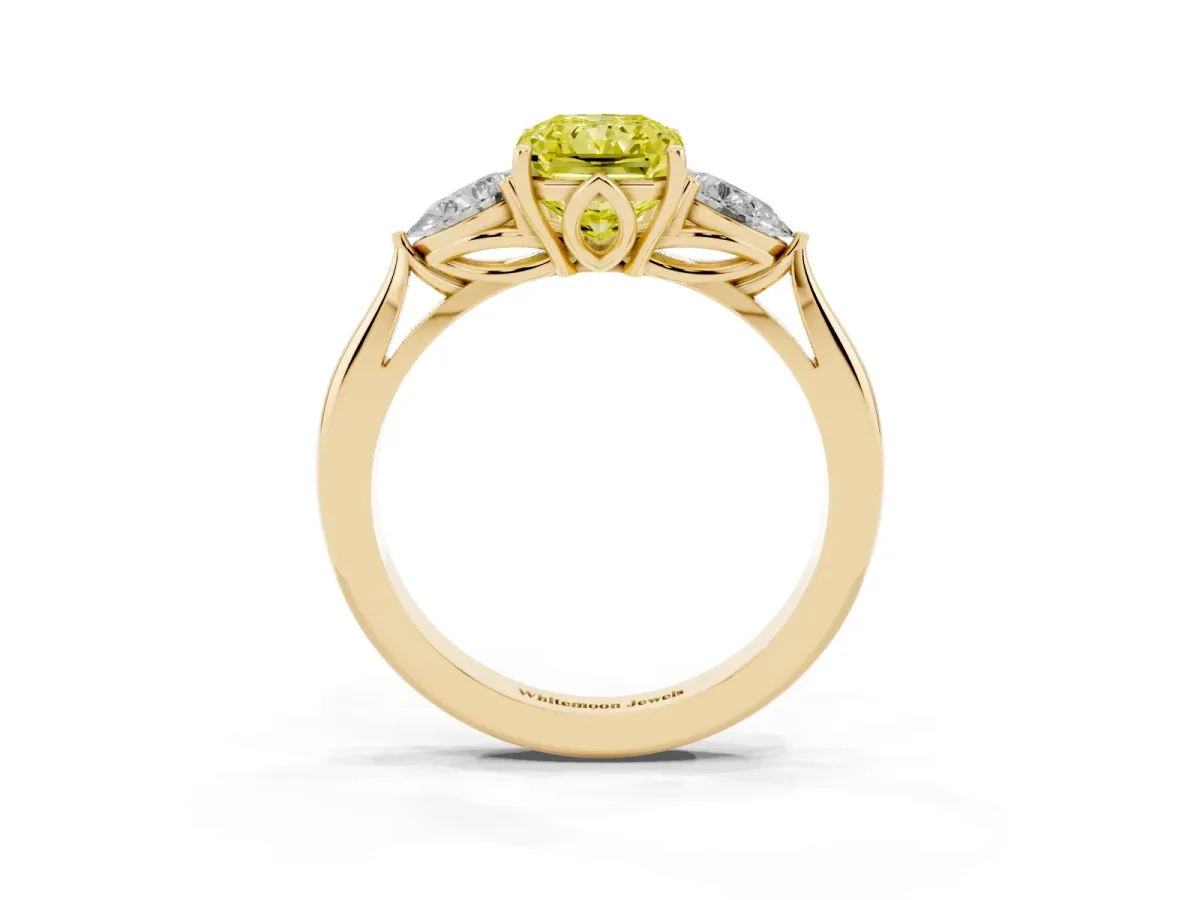 Fancy Yellow Three-Stone Radiant Cut Diamond Ring with Pear Side Stones in Four-Prong Setting Yellow gold