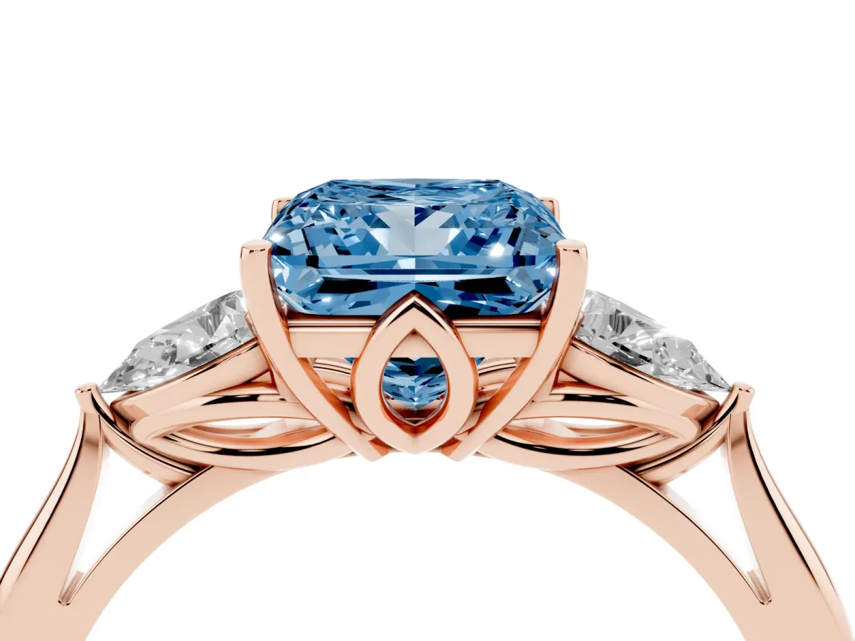 Fancy Blue Princess Cut Diamond Three-Stone Ring with Pear Side Stones and Prong Setting Rose gold