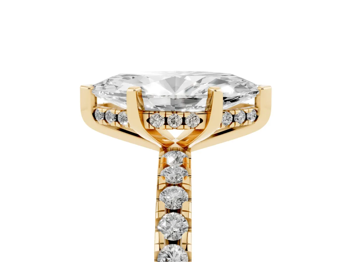 Marquise Cut Diamond Solitaire Ring with Round Pavé Band and Four-Prong Setting Yellow gold
