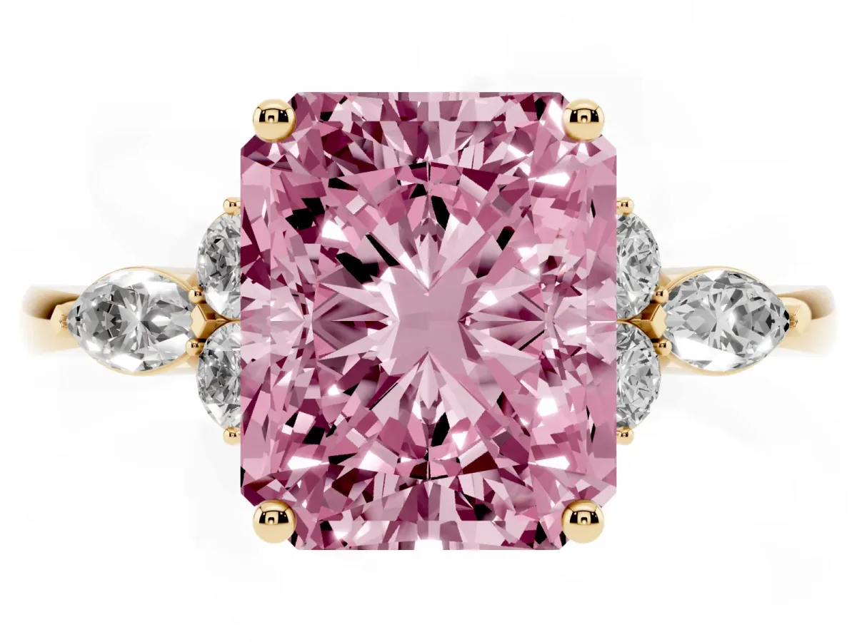 Fancy Pink Radiant Cut Brilliant Diamond Solitaire Ring with Pear Side Stones and Four-Prong Setting Yellow gold