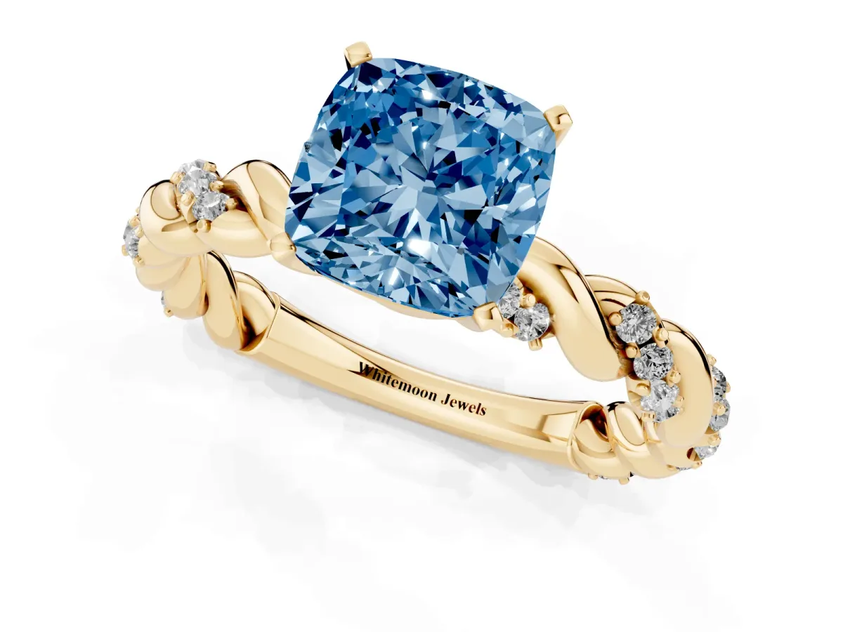 Fancy Blue Cushion Cut Diamond Solitaire Ring with Twisted Band and Pavé Accents Yellow gold