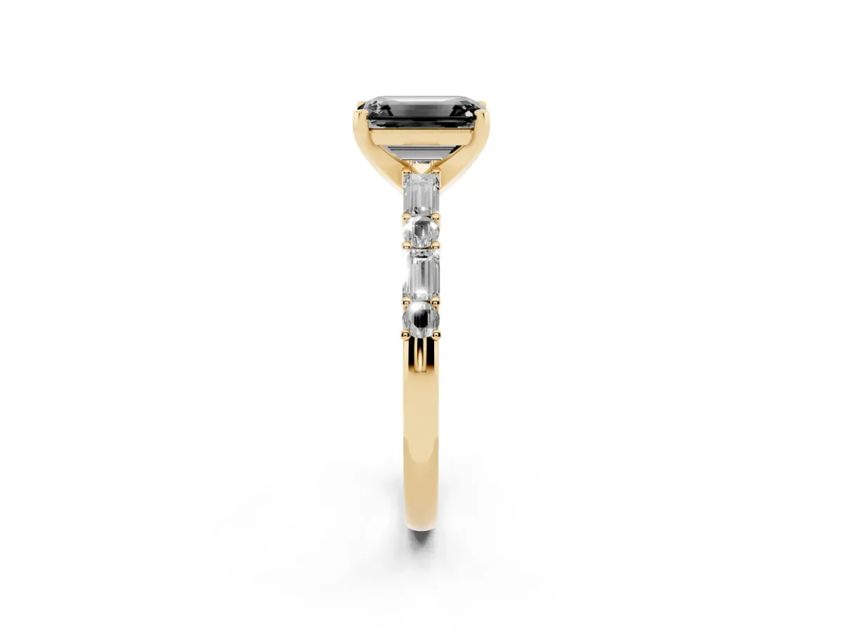 Fancy Black Emerald Cut Diamond Solitaire with Side Baguettes and Channel Set Band Yellow gold