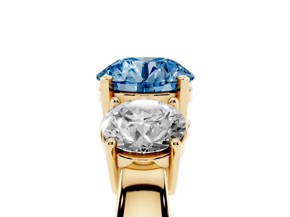 Fancy Blue Three-Stone Round Cut Diamond Ring with Round Side Stones, Classic Band, and Four-Prong Setting Yellow gold