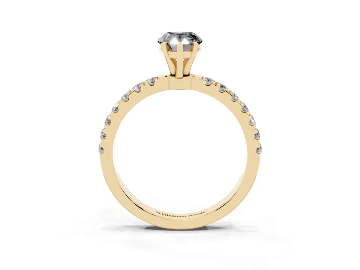 Fancy Black Pear Cut Diamond Solitaire Ring with Pavé Accents and Four-Prong Setting Yellow gold
