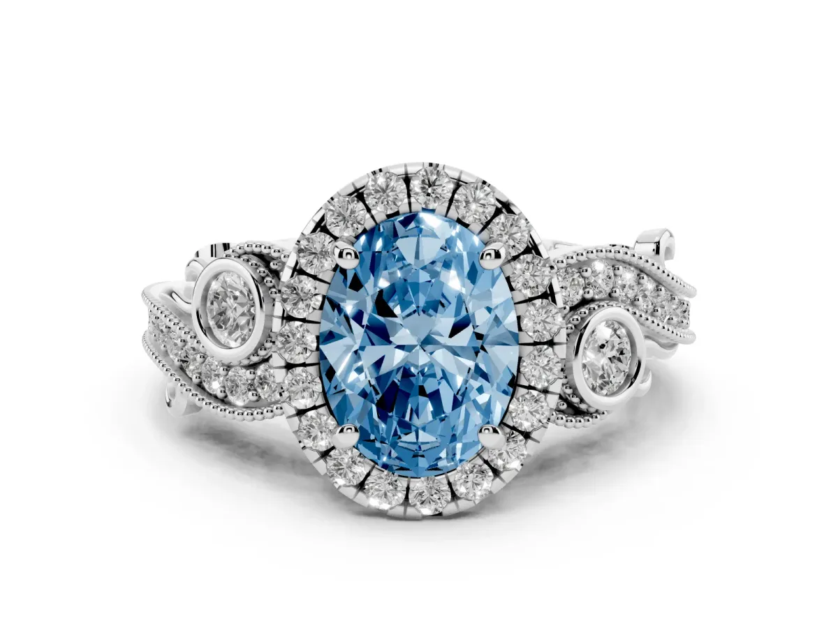 Fancy Blue Oval Cut Halo Diamond Ring with Milgrain and Bezel Accents on a Split Shank Band White gold