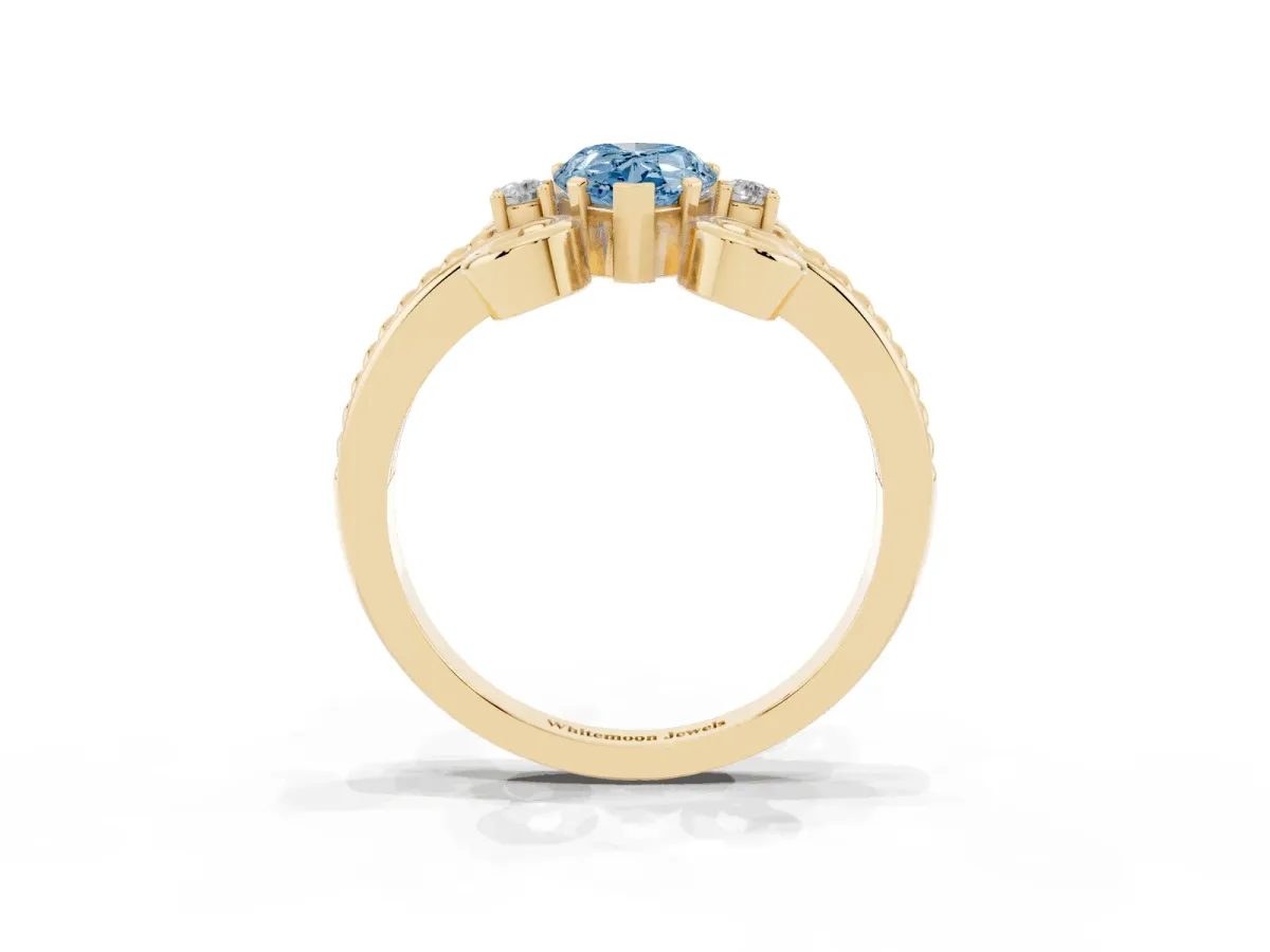 Fancy Blue Pear Cut Solitaire Twisted Band Scroll Prong Ring Yellow gold