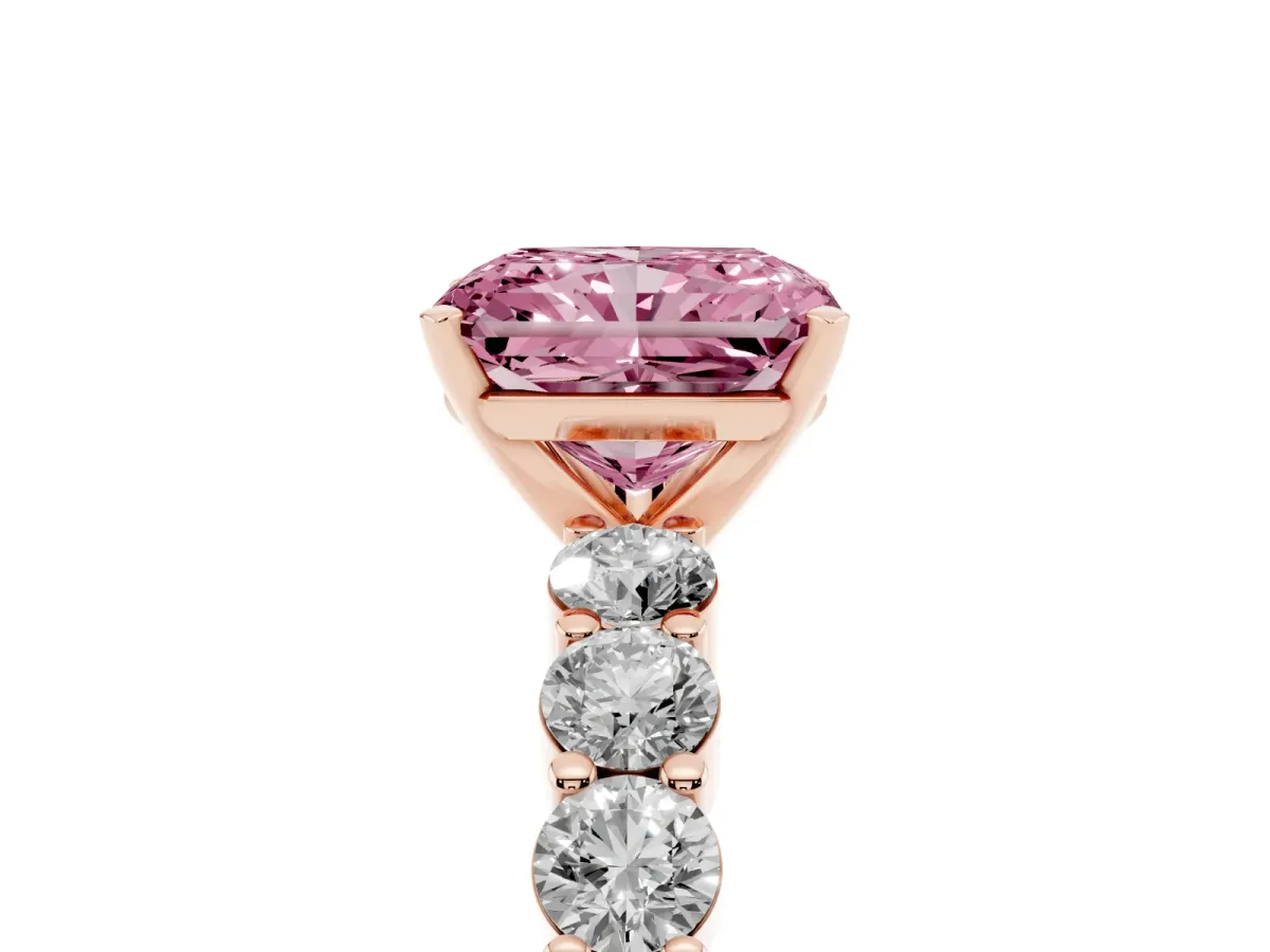 Fancy Pink Radiant Cut Diamond Solitaire Ring with Shared Prong Round Side Stones Rose gold